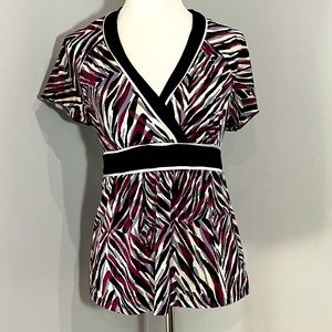 Black white and burgundy zebra striped top